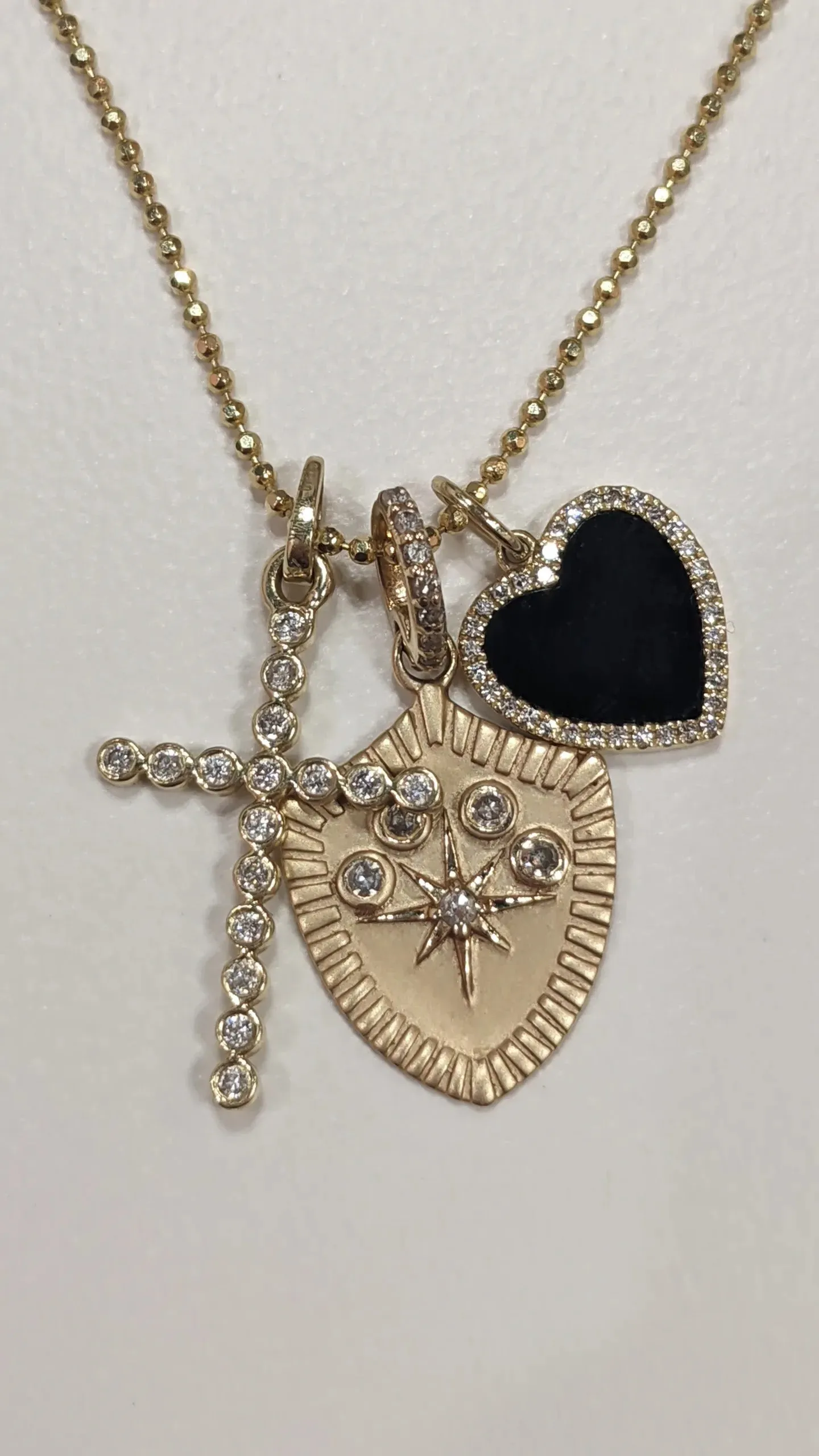 Gold Shield Pendant with North Star and Diamonds