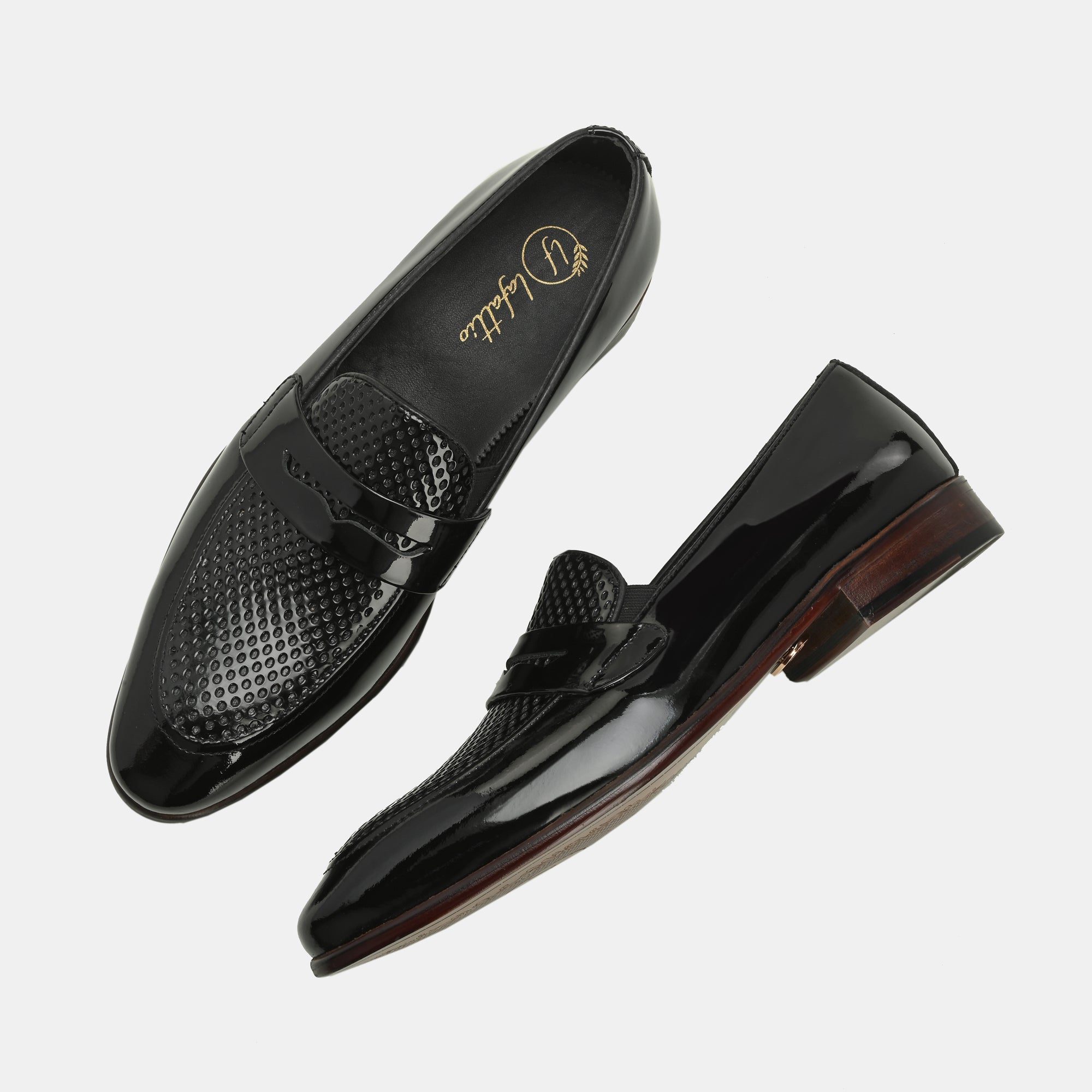 Patent Black Perforated Penny Loafers by Lafattio