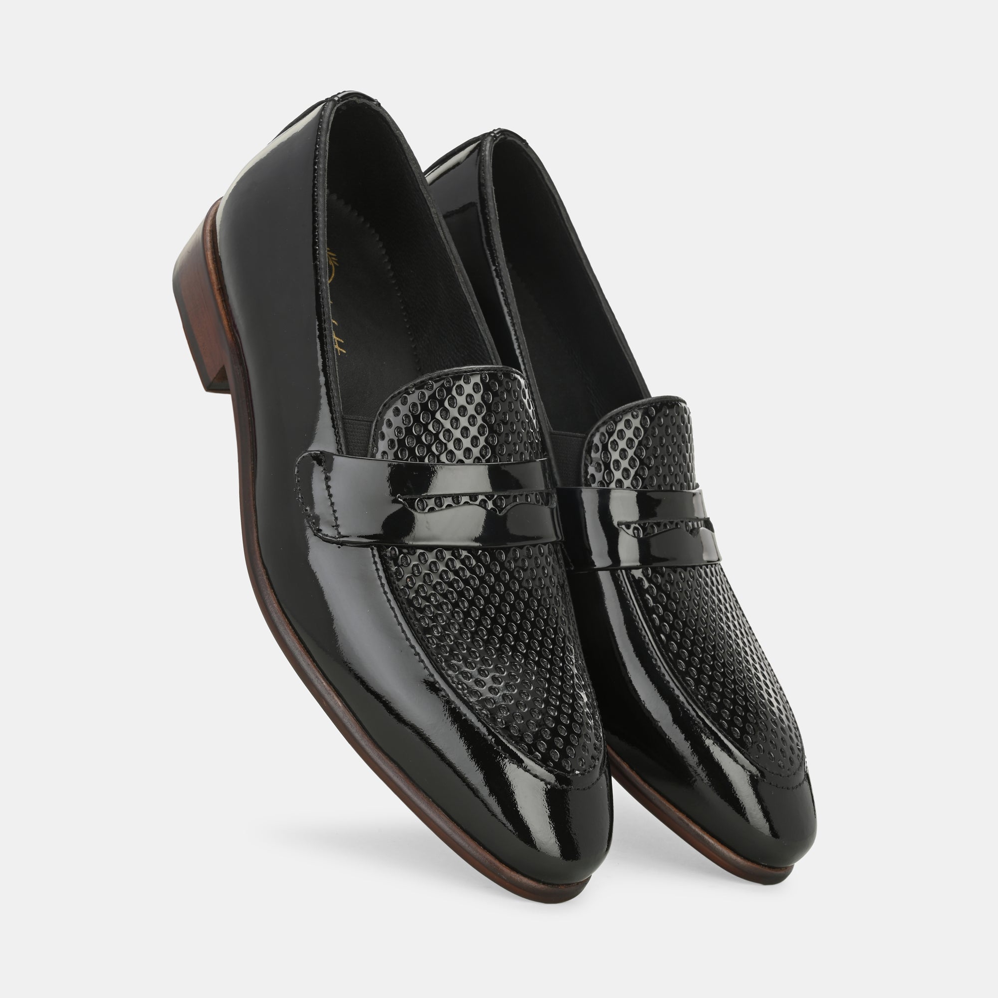 Patent Black Perforated Penny Loafers by Lafattio